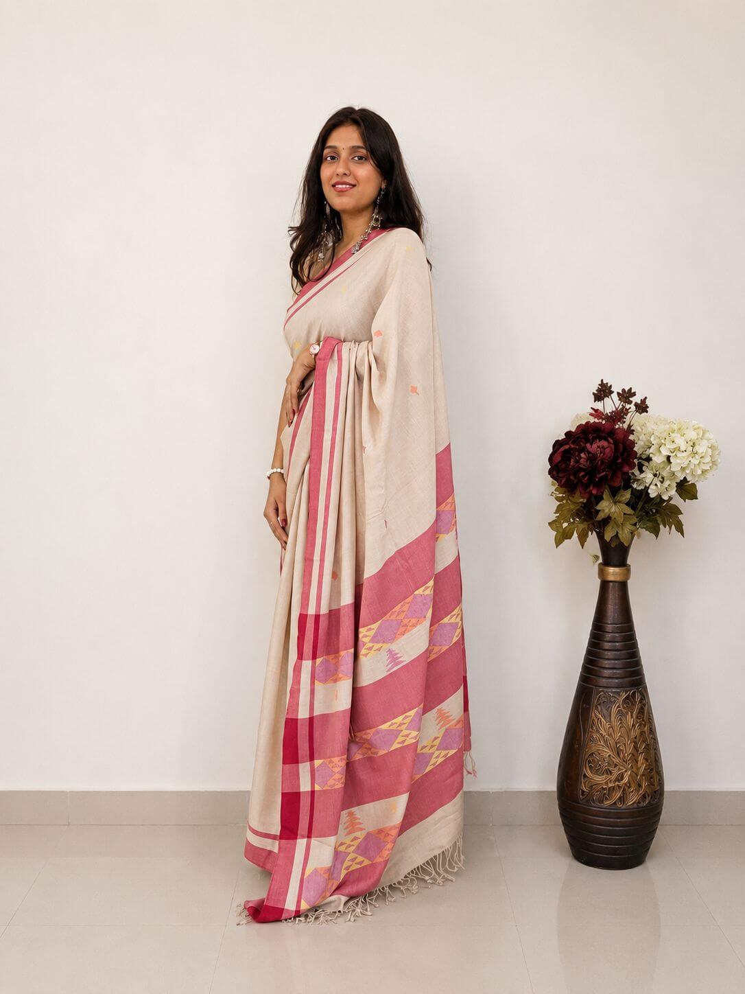 Handwoven cream and pink merino wool saree - close-up weave texture