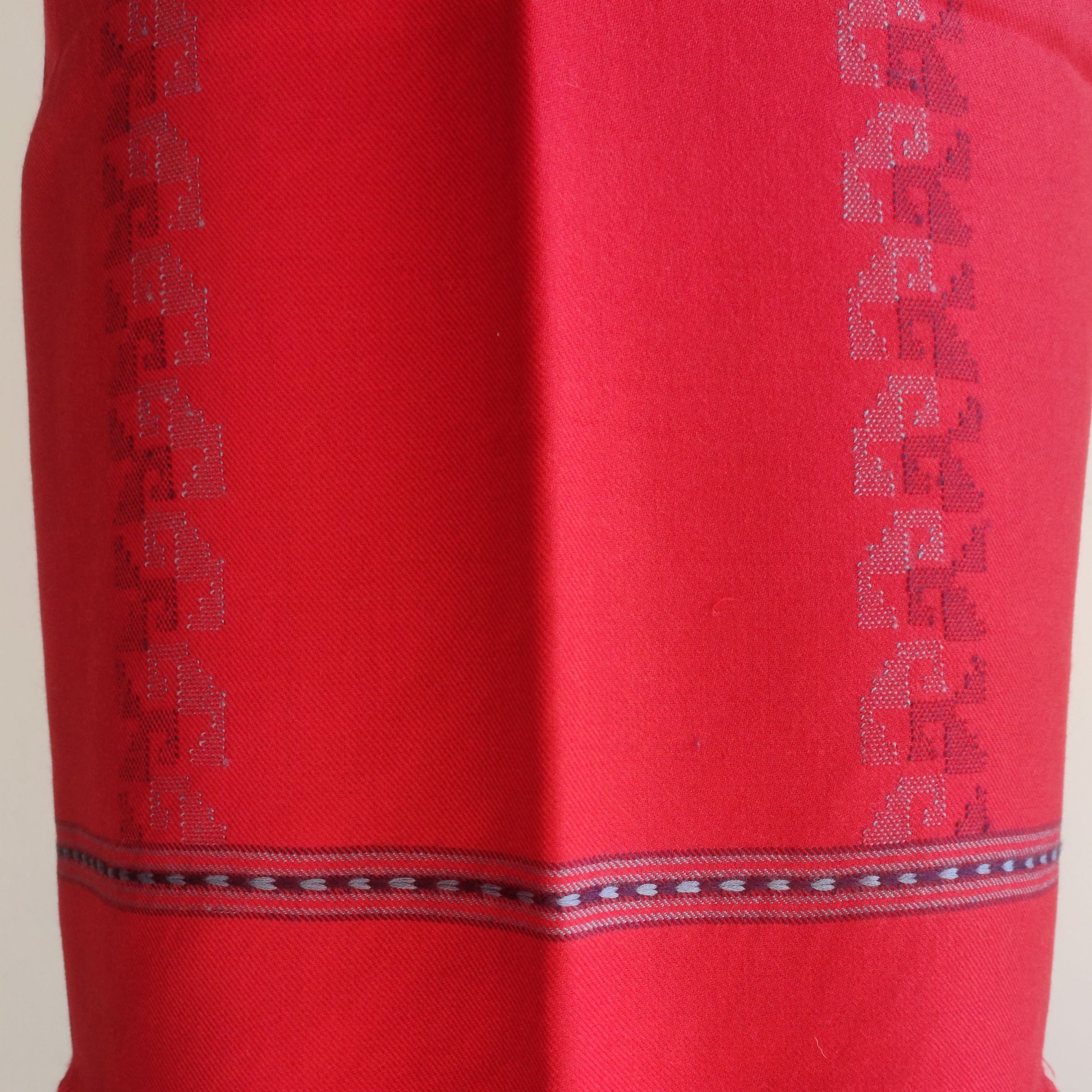 Red suit with intricate patterns- Bhuttico