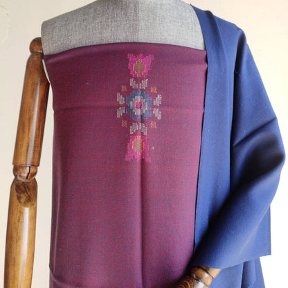 Mannequin wearing a purple women's woolen suit with floral patterns 