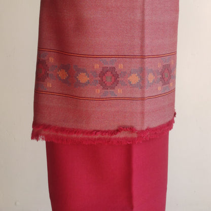 Red women's woolen suit with intricate patterns 