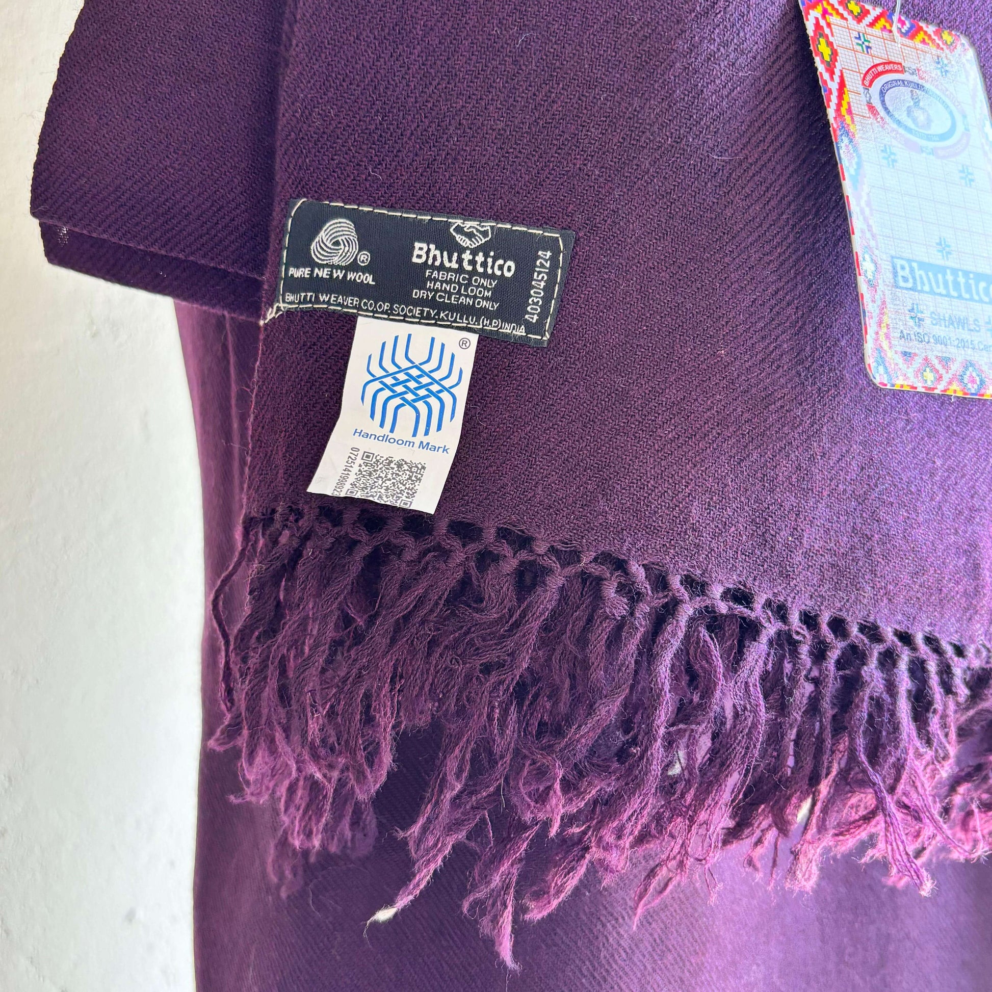Soft Merino wool fabric texture of Bhuttico women’s plum handwoven suit set