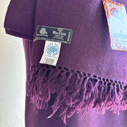 Soft Merino wool fabric texture of Bhuttico women’s plum handwoven suit set
