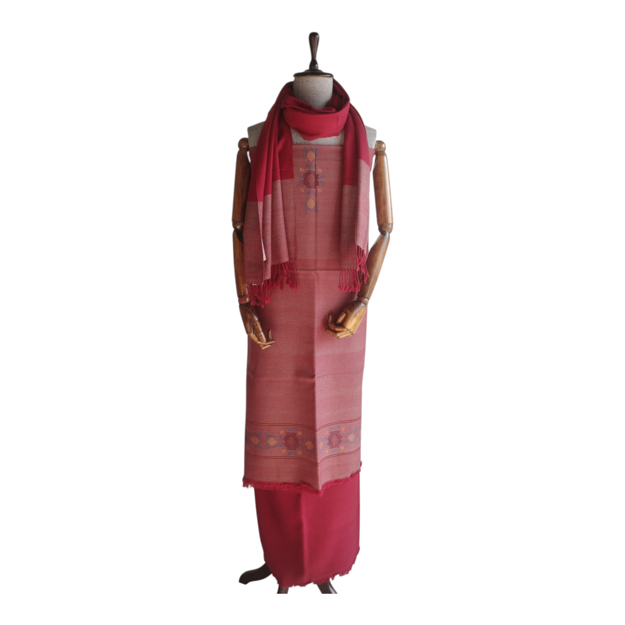 Red women's woolen suit with matching stole on a mannequin 