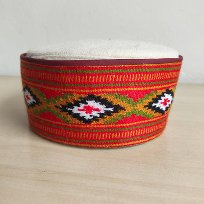 Handwoven Himachali cap with geometric diamond pattern - front view