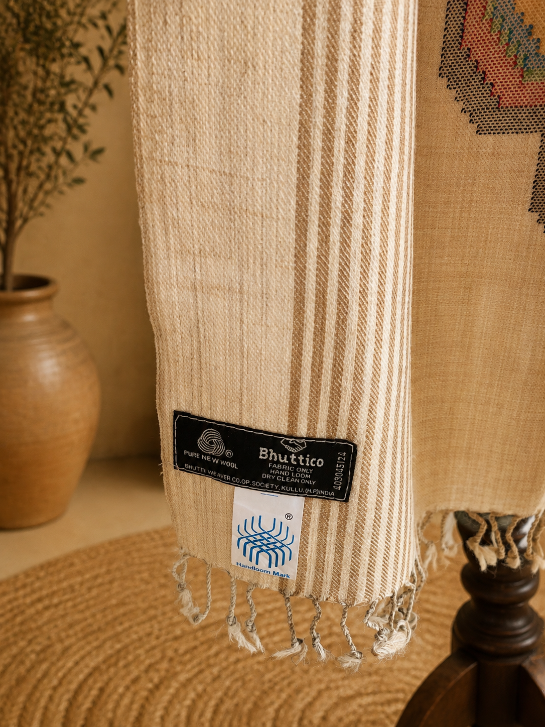 Handwoven pure merino wool Kullu stole in beige - styled view