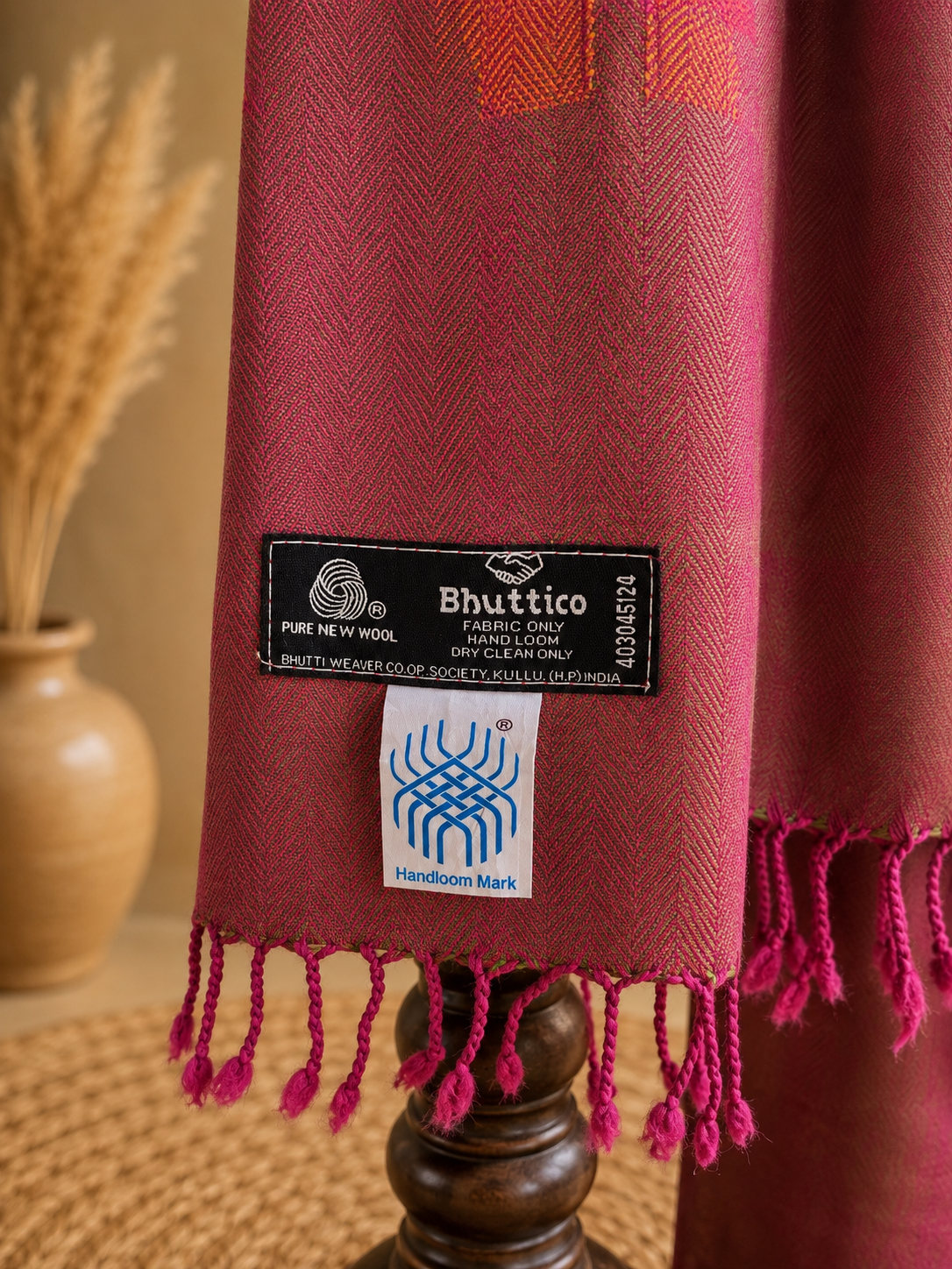 Handwoven pure merino wool Kullu stole in magenta - styled view