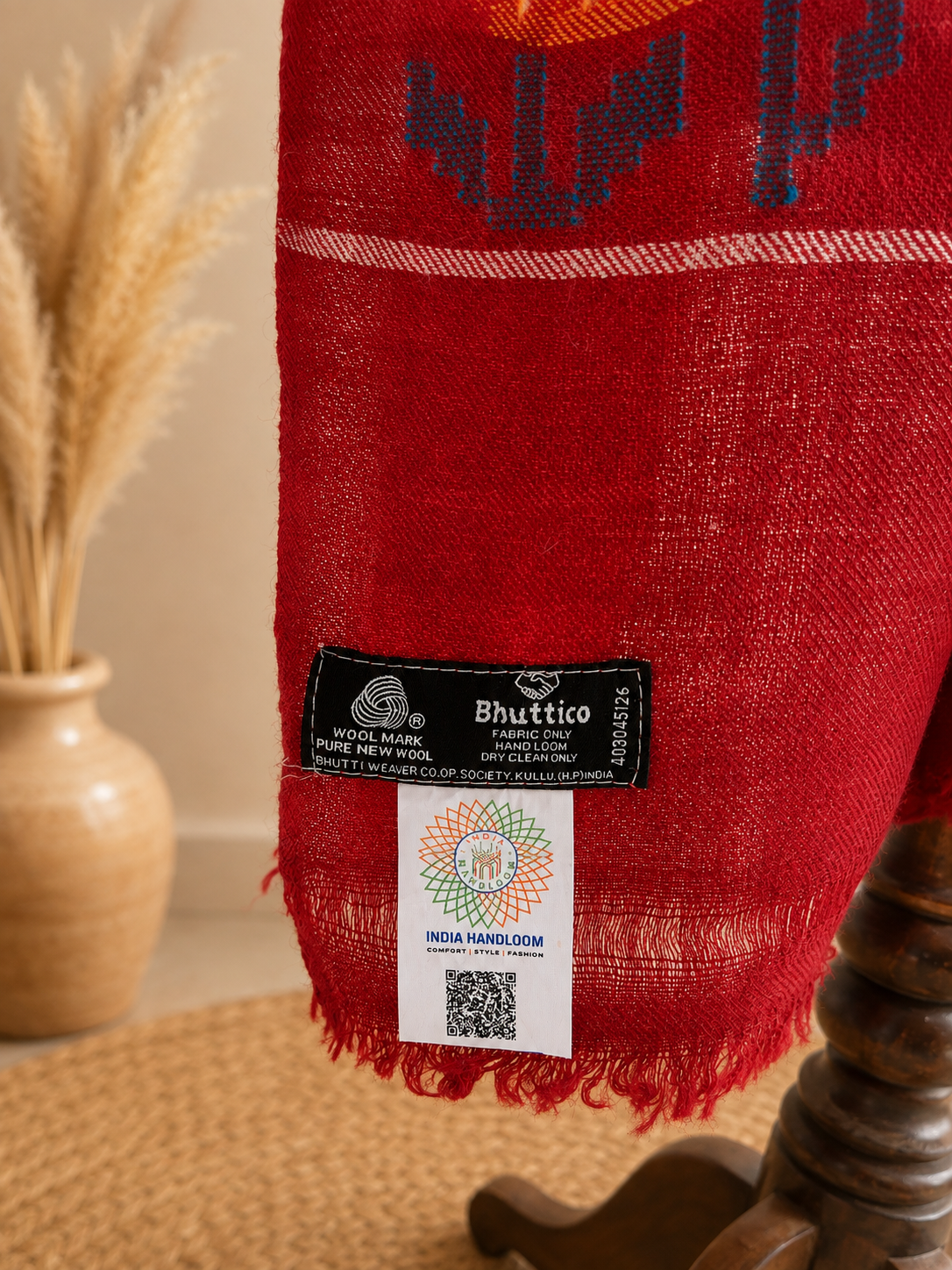 Handwoven pure merino wool Kullu stole in maroon - styled view