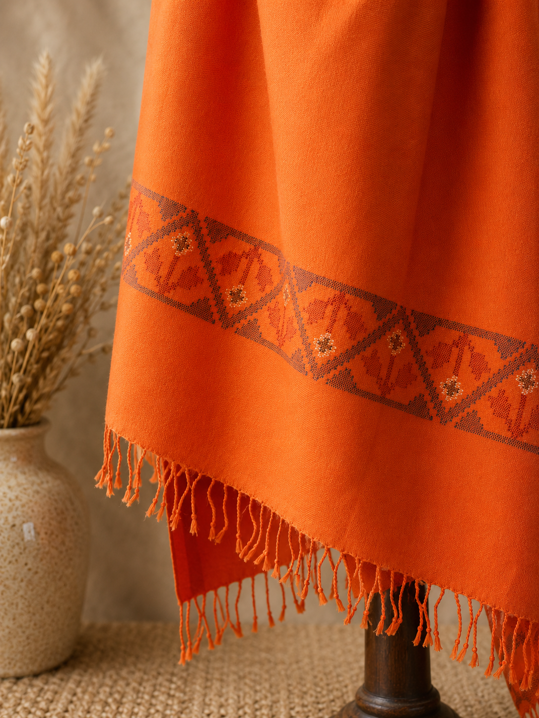 Handwoven Saffron Ember Kullu shawl in pure merino wool, orange - styled view