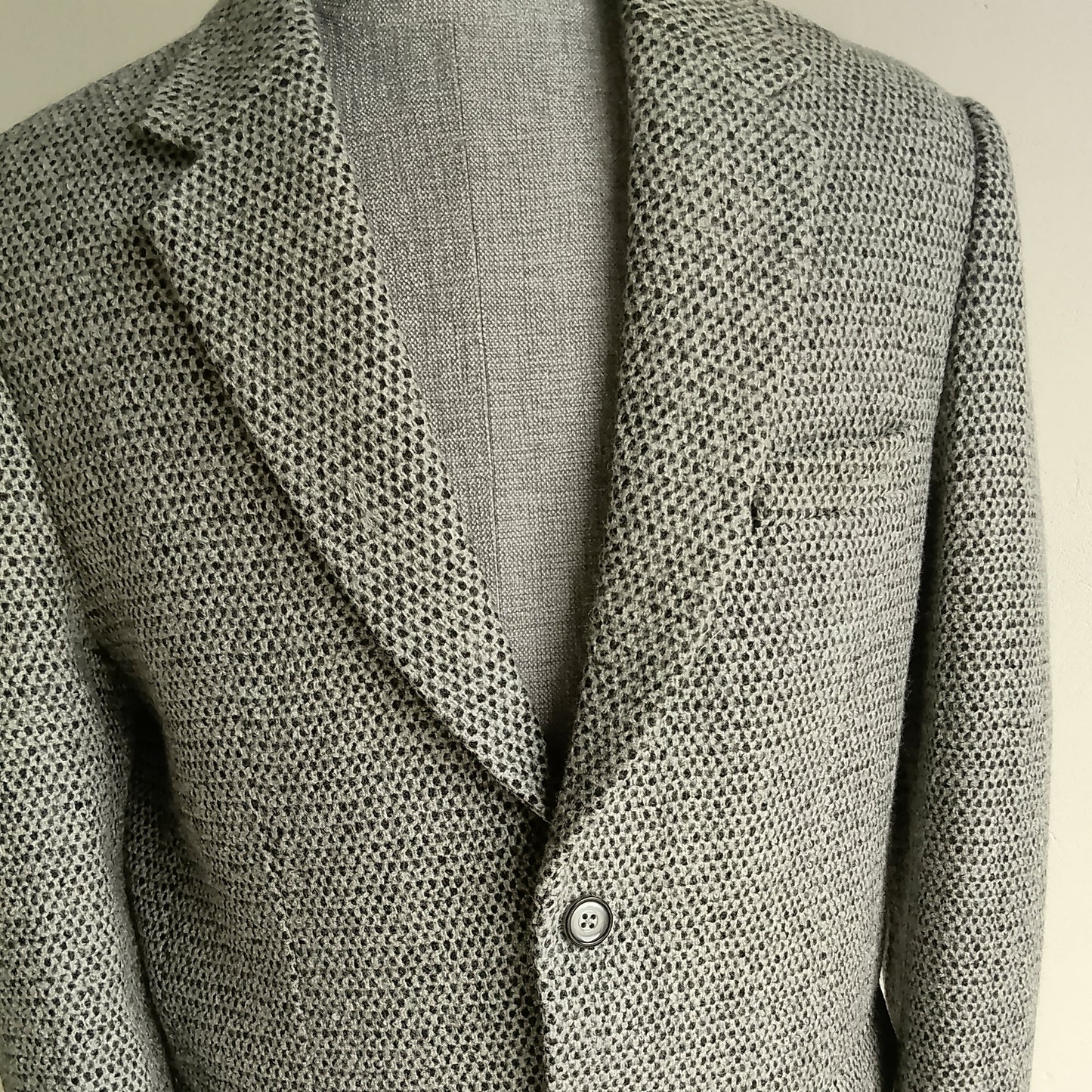 Men's handwoven black and white merino wool coat, honeycomb weave - back view