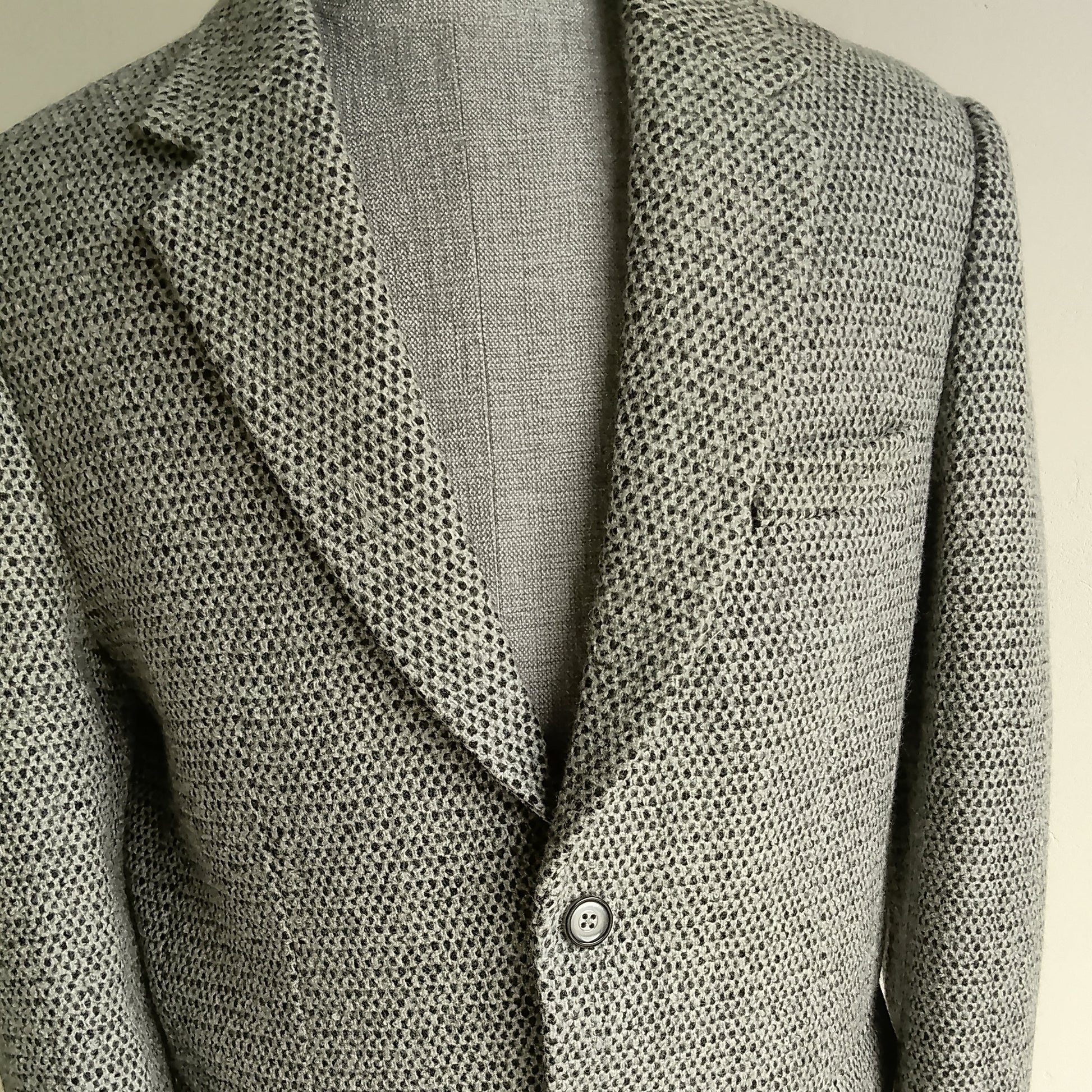 Men's handwoven black and white merino wool coat, honeycomb weave - back view