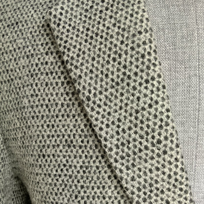 Men's handwoven black and white merino wool coat, honeycomb weave - styled view