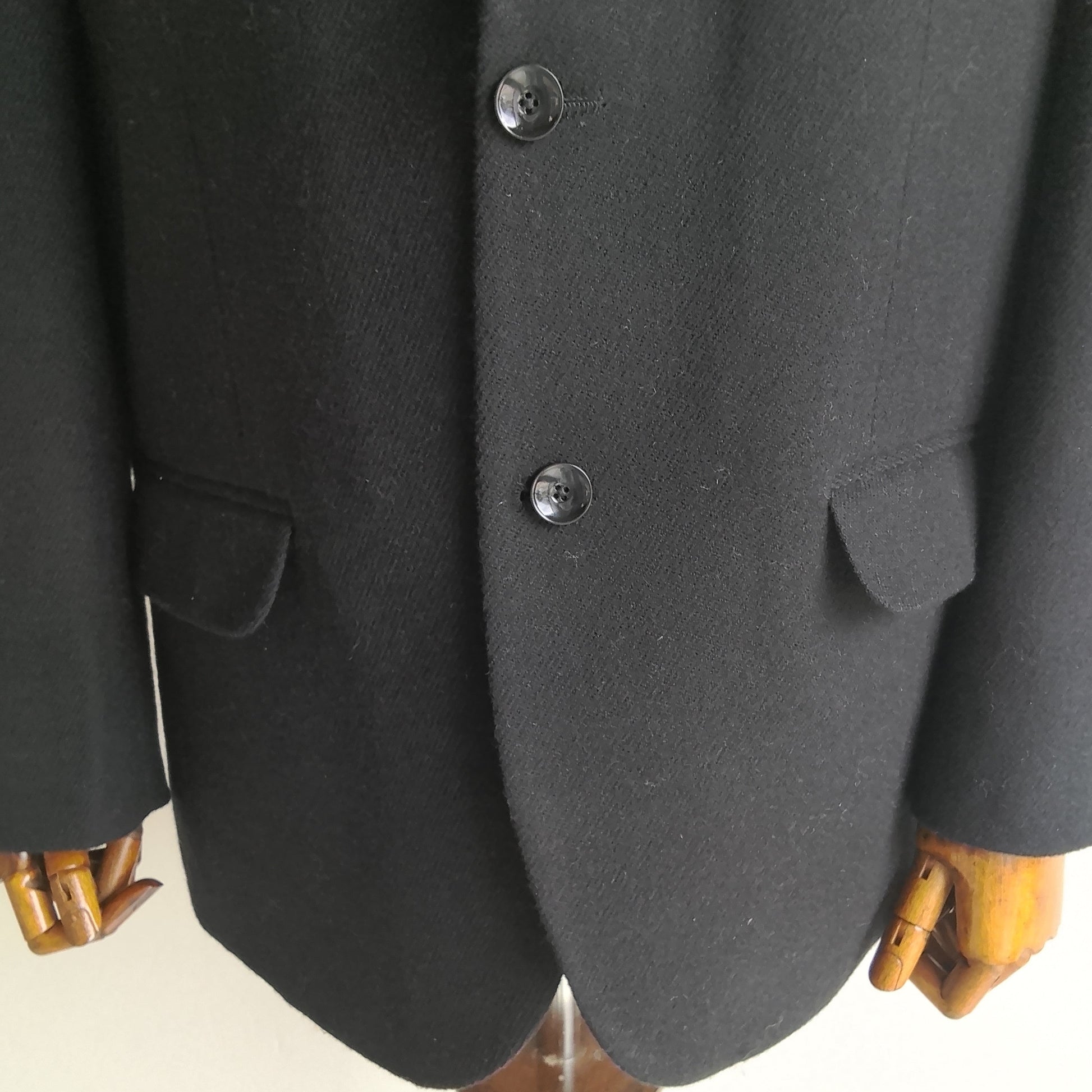 Men's handwoven black merino wool coat, twill weave - styled view